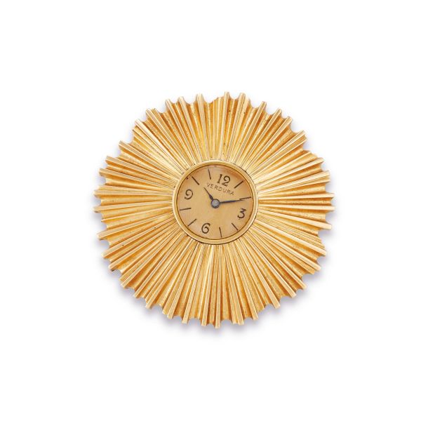 Verdura - 



VERDURA SUNLIKE BROOCH IN 18KT YELLOW GOLD WITH A WATCH