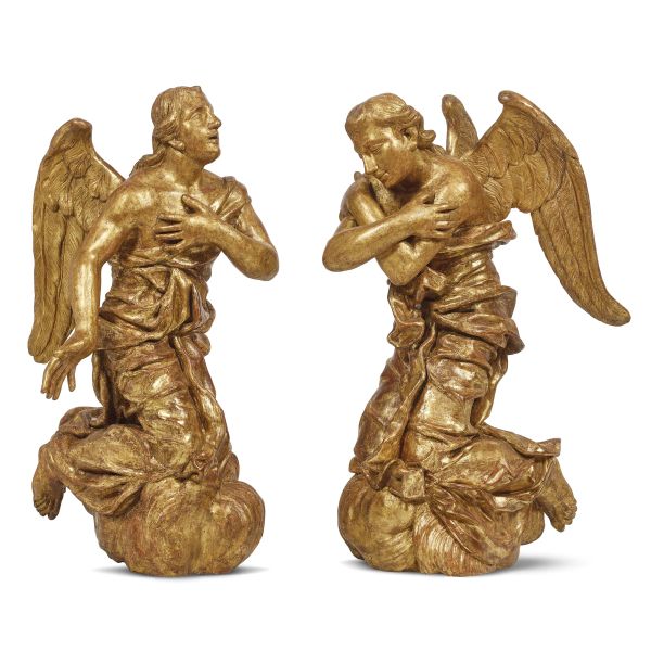Genoese sculptor, early 18th century, a pair of genuflected angles, gilt wood