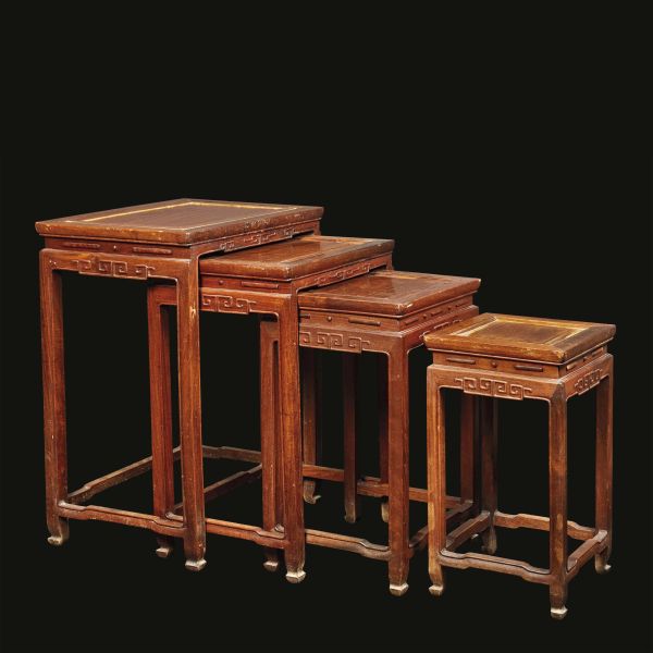 A SET OF FOUR QING DYNASTY, HONG WOOD NARROW WAISTLESS TABLES WITH HOOK-AMD-SCROL, CHINA, 20TH CENTURY