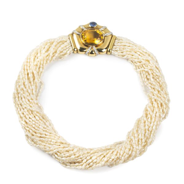 



MULTI-STRAND PEARL NECKLACE WITH CITRINE, SAPPHIRE AND DIAMOND IN 18KT YELLOW GOLD
