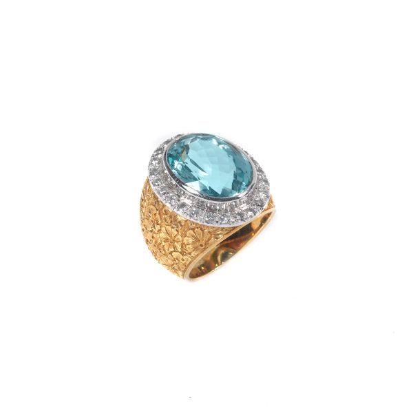 AQUAMARINE AND DIAMOND BAND RING IN 18KT TWO TONE GOLD