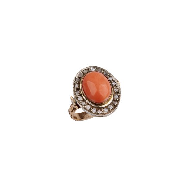 



CORAL AND DIAMOND RING IN GOLD AND SILVER 