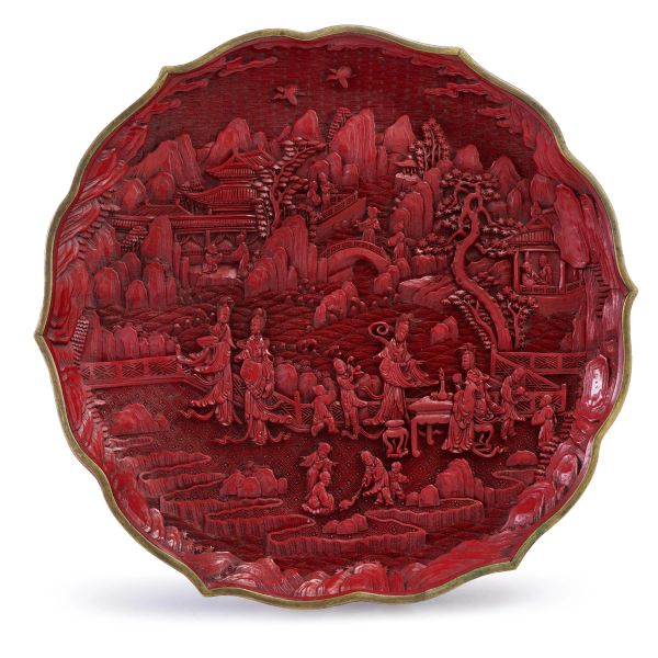 



A CARVED CINNABAR LACQUER DISH, CHINA, 20TH CENTURY 