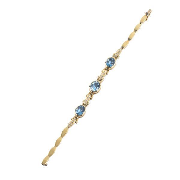 BRACCIALE CON TRE TOPAZI AZZURRI