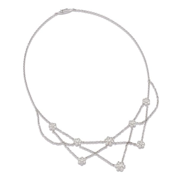 



COLLIER A CATENA CON DIAMANTI