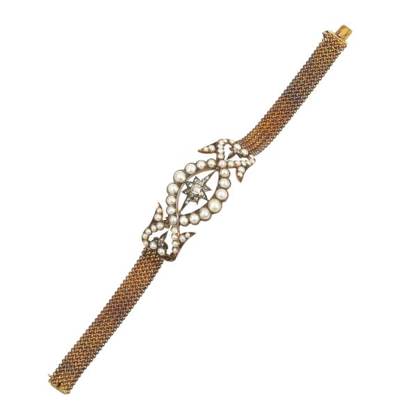 



BRACCIALE CON PERLE E DIAMANTI