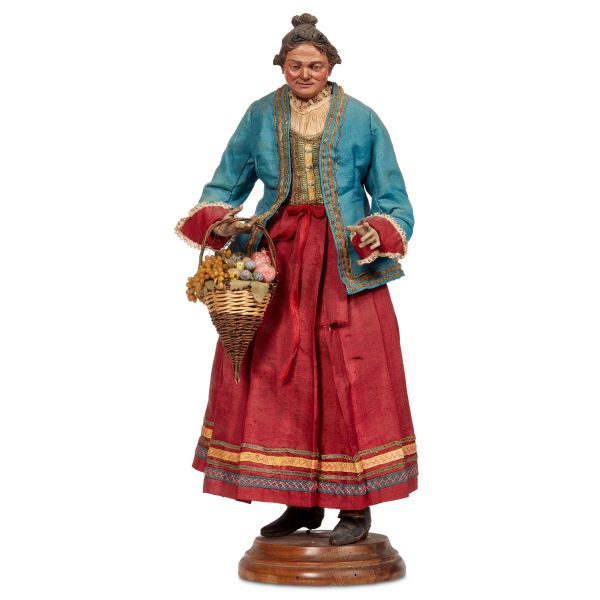 



A PEASANT WOMAN WITH A BASKET OF FRUIT, NAPLES, 18TH CENTURY