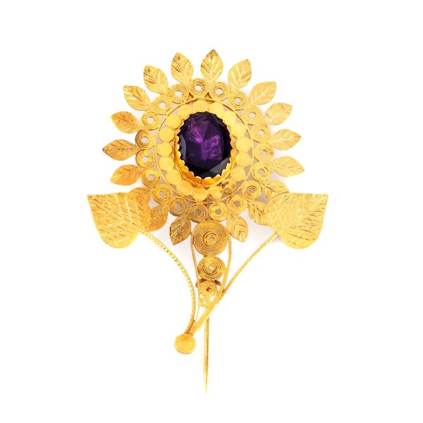 



FLOWER SHAPED BROOCH IN 18KT YELLOW GOLD