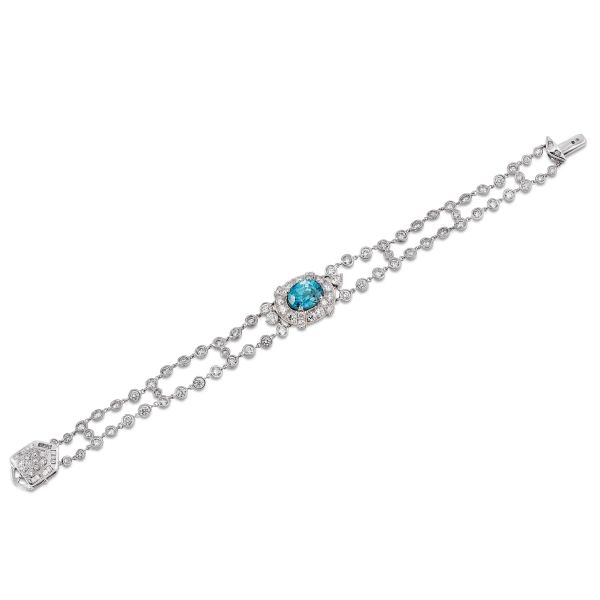 



BRACCIALE A FASCIA CON ZIRCONE BLU NATURALE E DIAMANTI