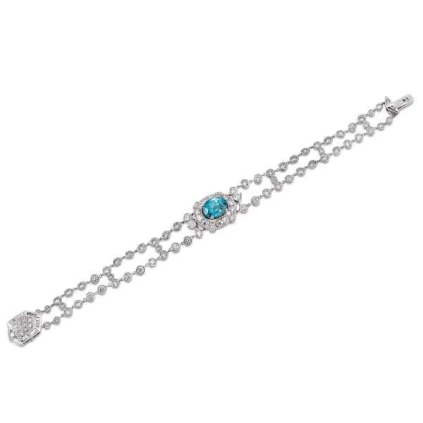 



NATURAL BLUE ZIRCON AND DIAMOND BAND BRACELET IN 18KT WHITE GOLD AND PLATINUM