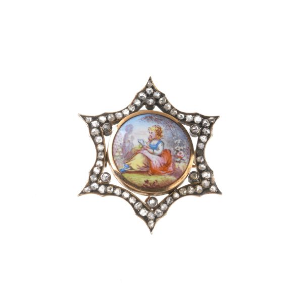 



STAR SHAPED BROOCH IN GOLD AND SILVER WITH AN ENAMELLED MINIATURE