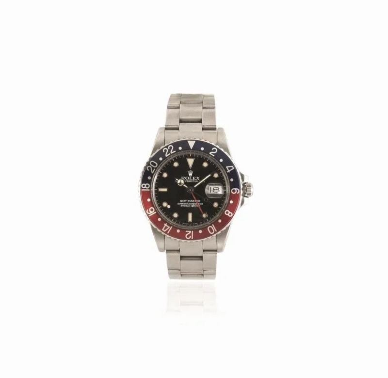 OROLOGIO DA POLSO ROLEX OYSTER PERPETUAL DATE GMT MASTER, REF. 16750 CASSA N. 8’901’700, 1985 CIRCA, IN ACCIAIO, CON SCATOLA  - Auction watches - II - Pandolfini Casa d'Aste