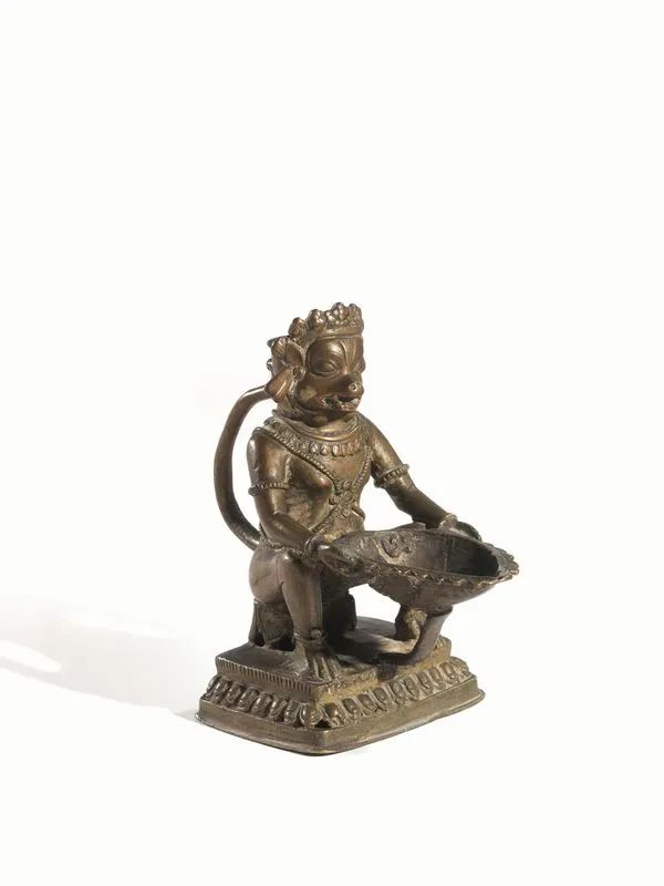  Hanuman, Nepal Sec. XVIII-XIX,  in bronzo, su base in legno alt. cm 14,8  - Auction Oriental Art - Pandolfini Casa d'Aste