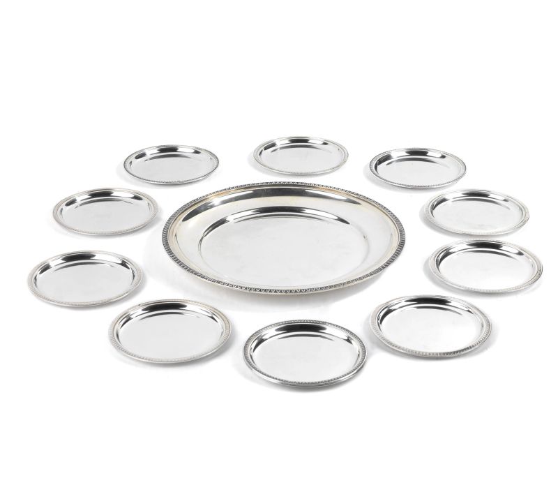 ELEVEN SILVER COASTERS AND ONE SILVER PLATE, 20TH CENTURY  - Auction TIME AUCTION| SILVER - Pandolfini Casa d'Aste