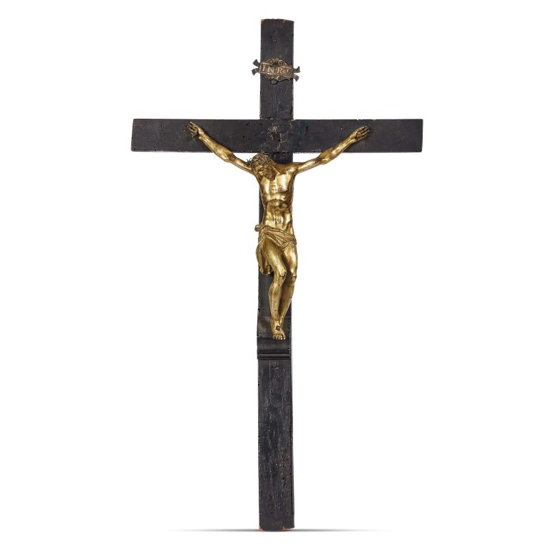 Cast from a model attribuited to Giambologna, early 17th century, Crucified Christ, gilt bronze assembled on ebonised wooden cross, 25x20 cm (Christ)  - Auction 15th to 19th CENTURY SCULPTURES - Pandolfini Casa d'Aste