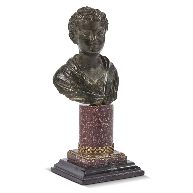 Rome, 17th century, A bust of a child, bronze, h. 11 cm on a porphyry base, 19,5x8,5x8 cm (overall)  - Auction Sculptures and works of art from the middle ages to the 19th century - Pandolfini Casa d'Aste