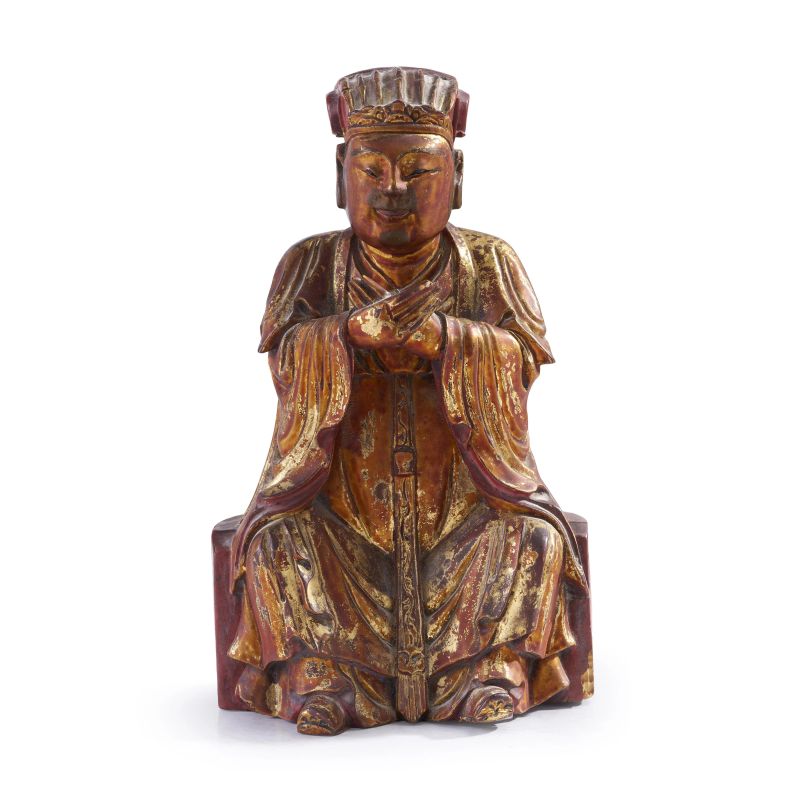 



A GILT WOOD FIGURE OF A DAOIST DEITY, CHINA, LATE QING TO REPUBLIC PERIOD (LATE 19TH&ndash;EARLY 20TH CENTURY) seated on a square base with hands clasped, wearing an official robe and headdress.   - Auction Asian Art | 东方艺术 - Pandolfini Casa d'Aste