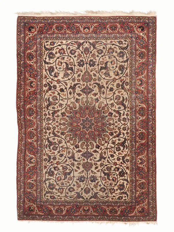 Tappeto persiano Tabriz, inizi sec.XX, fondo avorio cosparso da decori floreali verdi, rosa e giallo, bordura con fiori stilizzati azzurro e rosso,&nbsp; cm 310x225  - Asta Mobili, Arredi e Oggetti d'Arte - Pandolfini Casa d'Aste