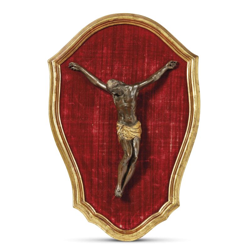 Tuscany, late 17th century, A Cross, bronze, 27x20,5 cm on a panel covered by red velvet, 43x28,5 cm  - Auction Sculptures and works of art from the middle ages to the 19th century - Pandolfini Casa d'Aste