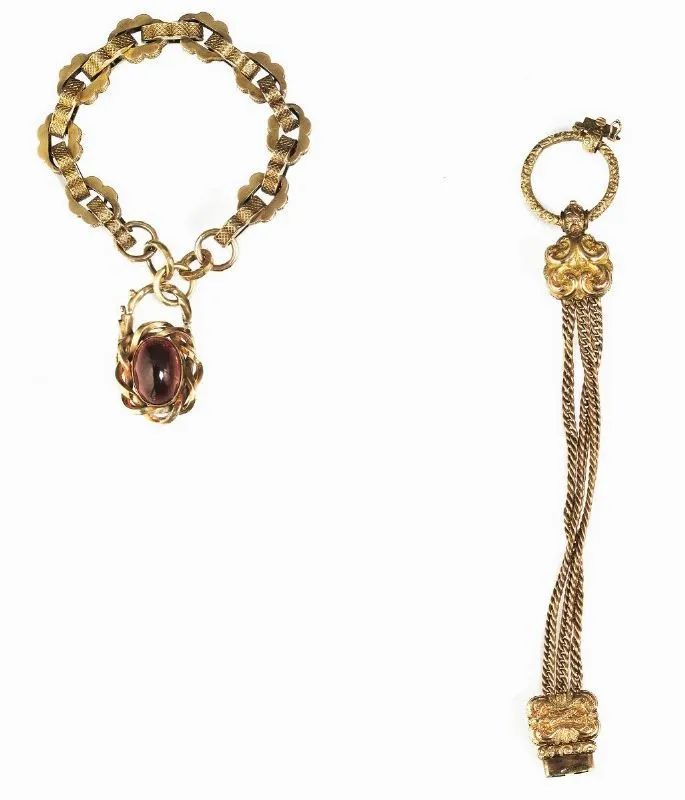 DUE BRACCIALI IN ORO A BASSO TITOLO E GRANATO  - Auction Fine Jewels and Watches - Pandolfini Casa d'Aste