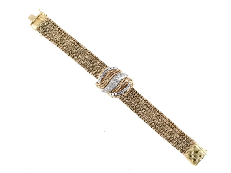 BRACCIALE OROLOGIO IN ORO GIALLO 14 KT E DIAMANTI  - Asta Gioielli, orologi da polso e da tasca, penne e argenti - Pandolfini Casa d'Aste