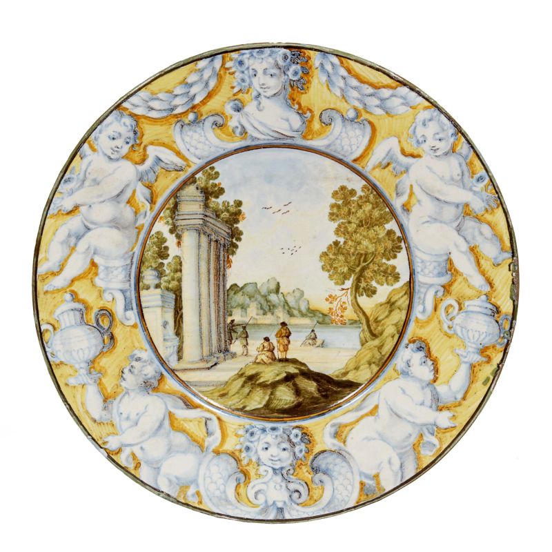 A CARMINE GENTILI PLATE, CASTELLI, FIRST HALF 18TH CENTURY  - Auction ONLINE AUCTION | CERAMICA. MAIOLICHE E PORCELLANE DAL XVI AL XIX SECOLO - Pandolfini Casa d'Aste