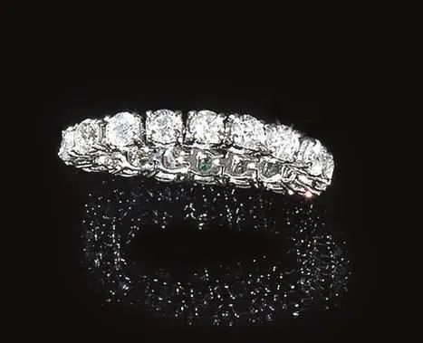 Anello 'eternity' in oro bianco e diamanti  - Auction Silver, jewels, watches and coins - Pandolfini Casa d'Aste
